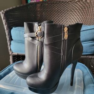 black and gold high heel boots
